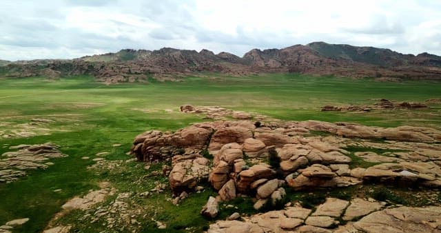 Vast landscape with rocky hills