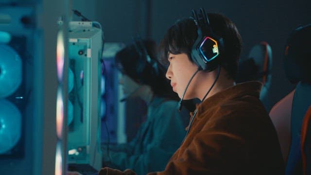 Focused Gamers Competing in E-Sport