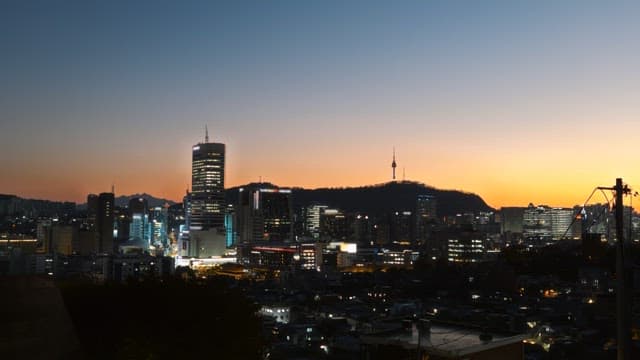 Cityscape with sunset over the skyline