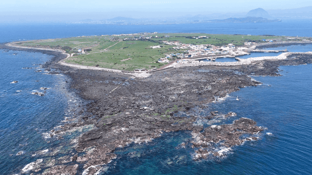 Coastal village with rocky shoreline