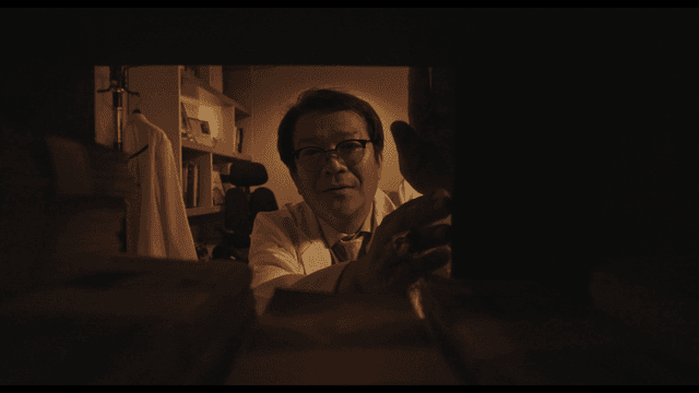 Doctor happy seeing stacked money