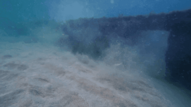 Underwater view with sand and rocks
