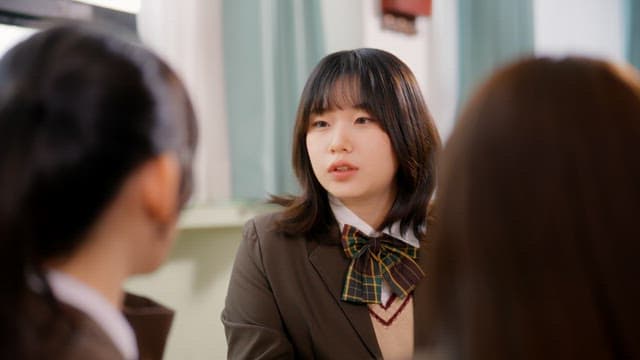 Students chatting in a classroom