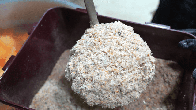 Ladle for scooping out dried fish seasoning from container