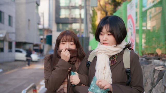 Students walking on the street in winter