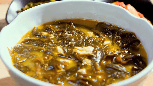 A bowl of Korean seaweed soup on a table