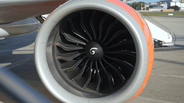 Close-up of an airplane engine on the tarmac