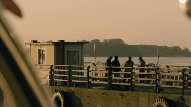 People on evening sea pier