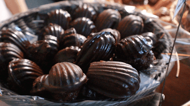 Plate of chocolate-covered madeleines