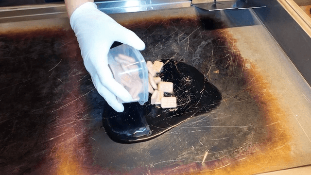 Bread spread on hot, oiled griddle