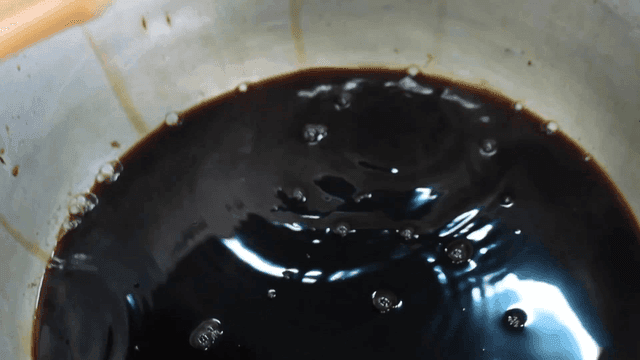 Soy sauce strained through a sieve