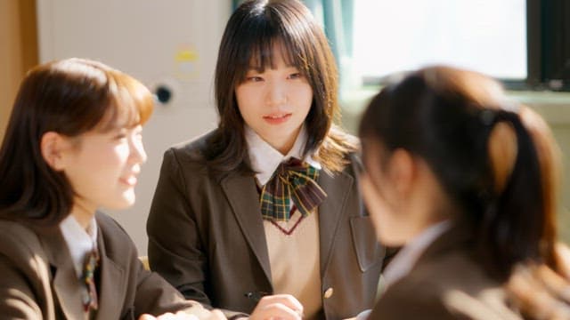 Students chatting in a classroom