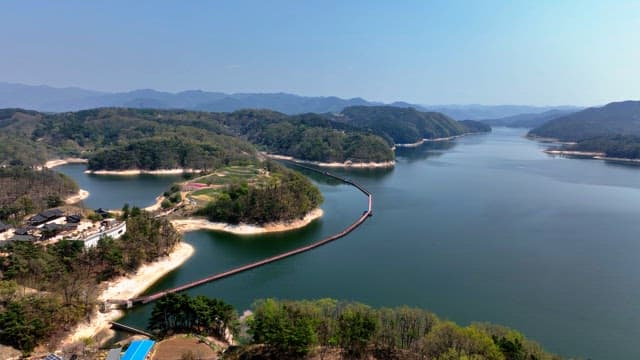 Scenic lake surrounded by lush mountains