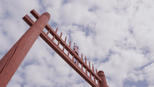 Traditional gate under cloudy sky
