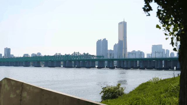 City skyline and bridge over river