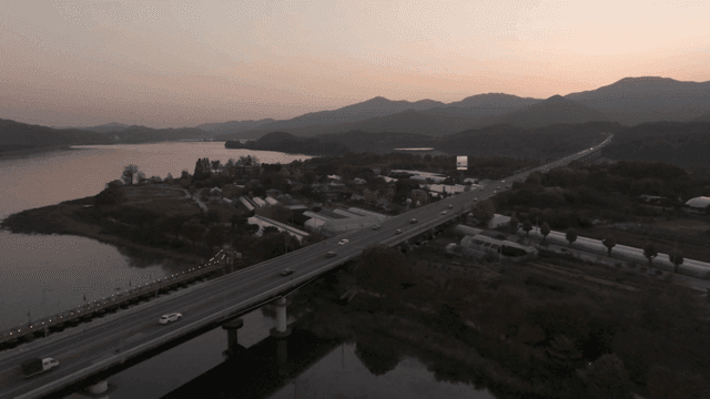 Bridge over mountain and river