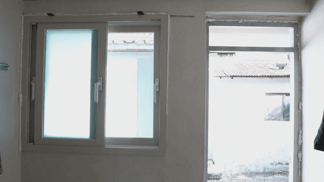 Interior view of a room with windows