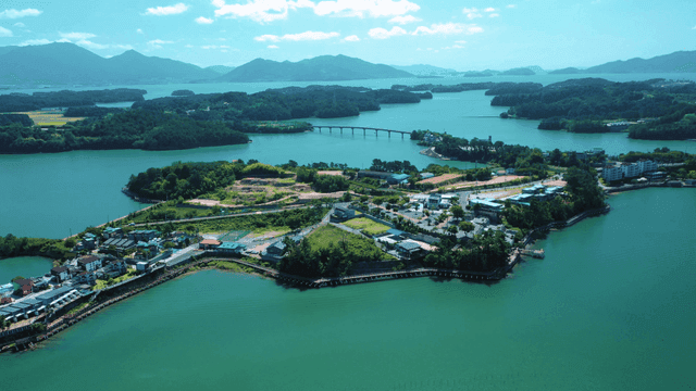 A scenic island surrounded by blue waters
