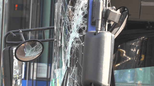 Bus with broken front windshield