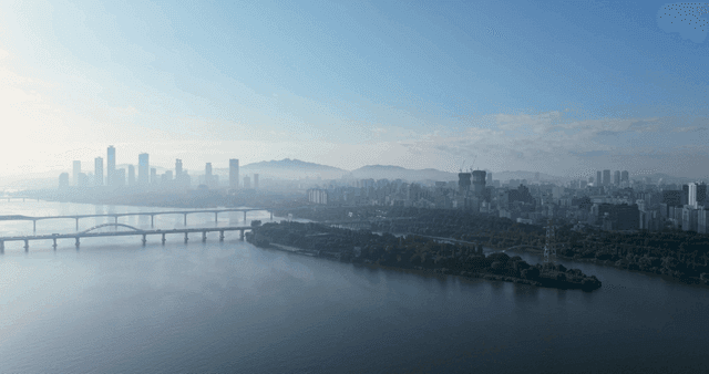 City skyline with bridge over river