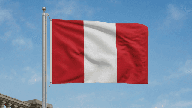 Peruvian flag fluttering under clear sky