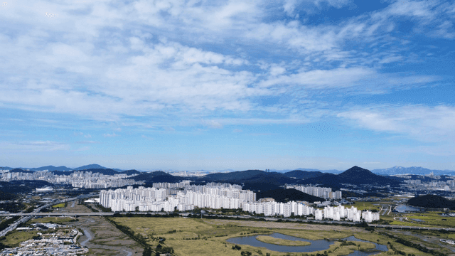Large city surrounded by mountains