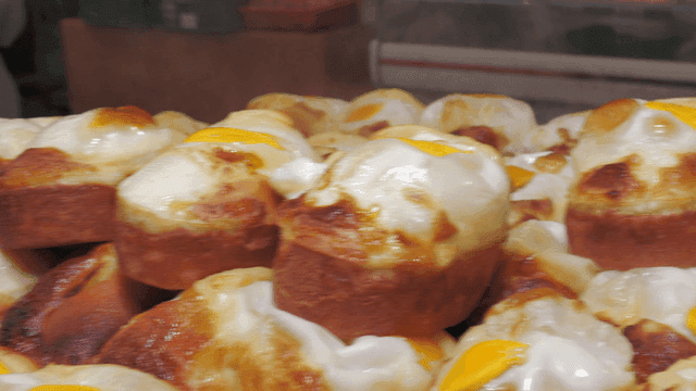 Freshly baked egg bread piled high