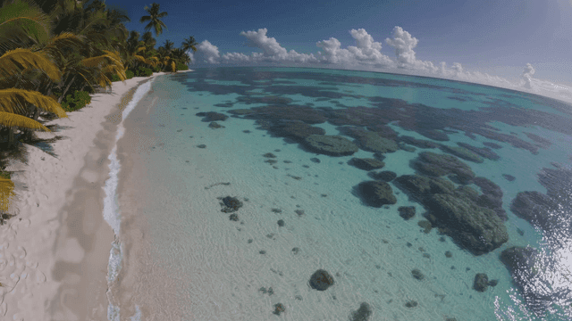 Tropical beach with clear seawater