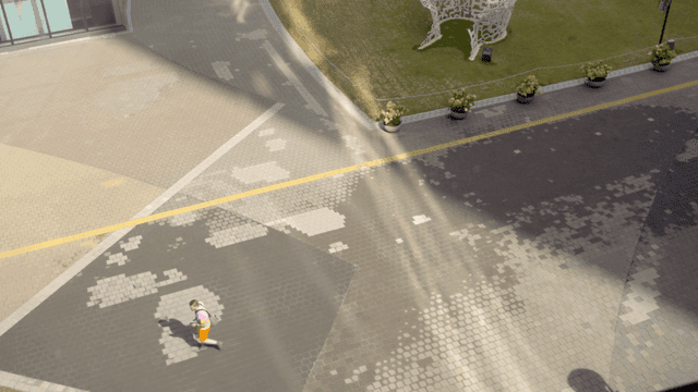 Person walking in a modern plaza