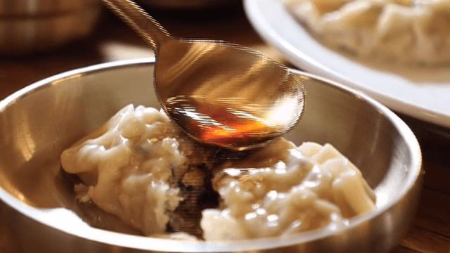 Spoon for pouring soy sauce onto dumplings
