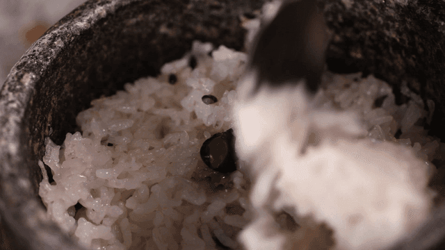Spoon for mixing rice with beans in stone pot