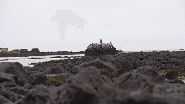 Coastal rocks with a distant view of the sea
