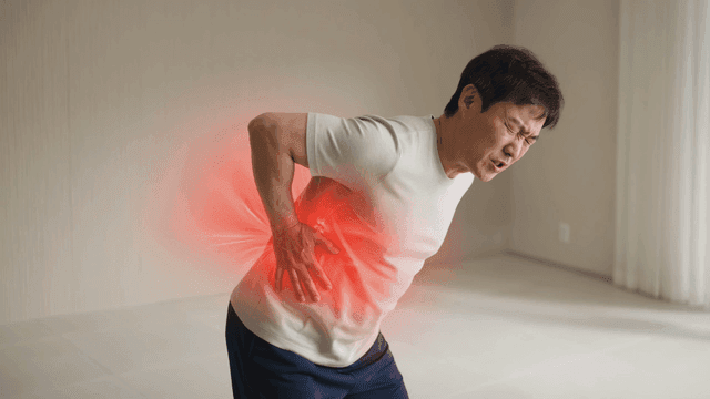 Men suffering from back pain