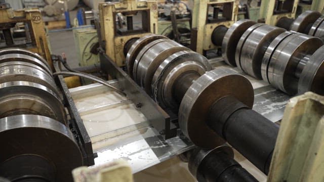 Metal rollers in a manufacturing process