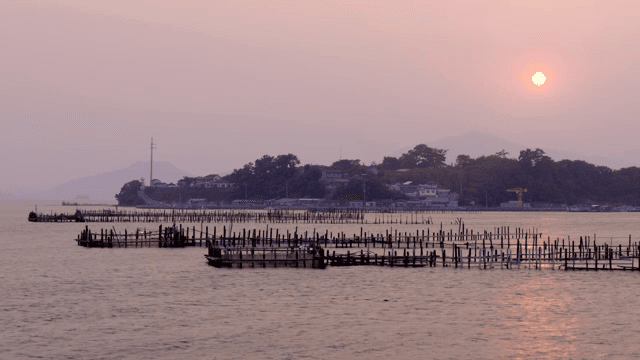 Sunset over a serene coastal village