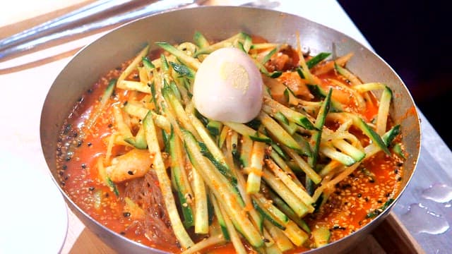 Spicy cold buckwheat noodles with cucumbers and egg