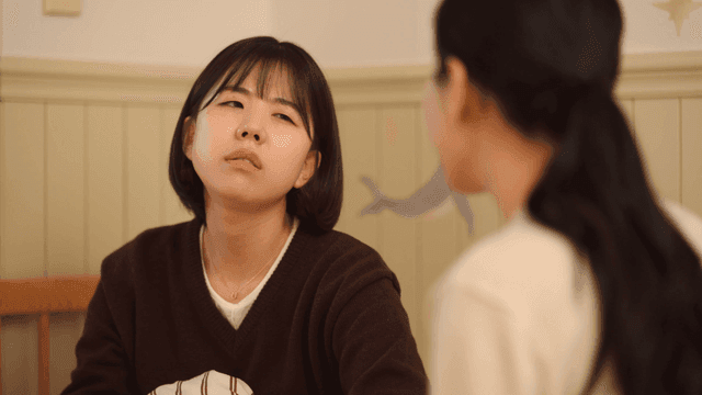 Mother and daughter having serious conversation