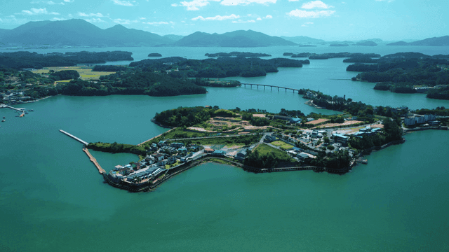 A scenic island surrounded by blue waters