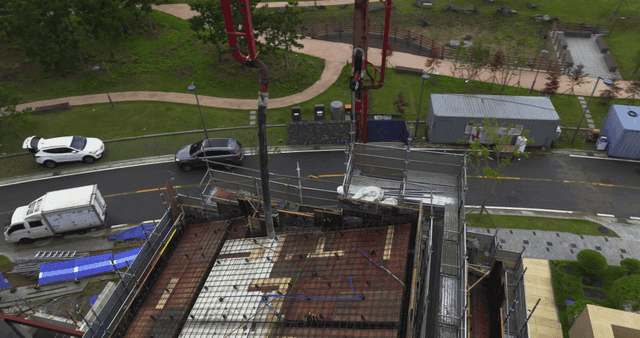 Construction site with concrete pump