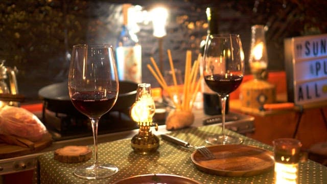 A cozy evening dinner with wine