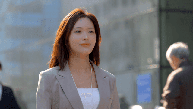 Working woman leisurely stepping out onto street