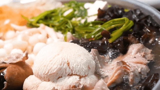 Mushroom stew with mushrooms and vegetables boiling