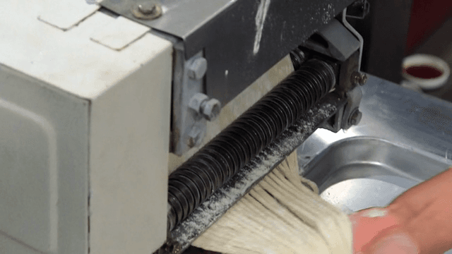 Kalguksu noodles being made with a machine