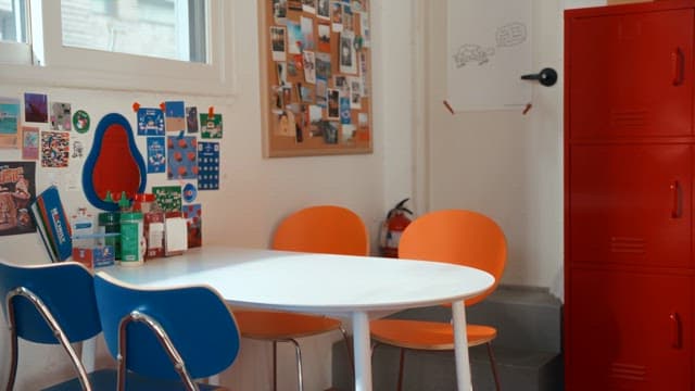 Couple sitting at a table in a pizza shop