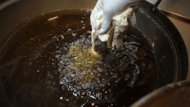 Battered sweet and sour pork fried in oil