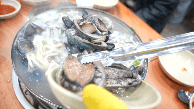 Abalone on top of kalguksu pot