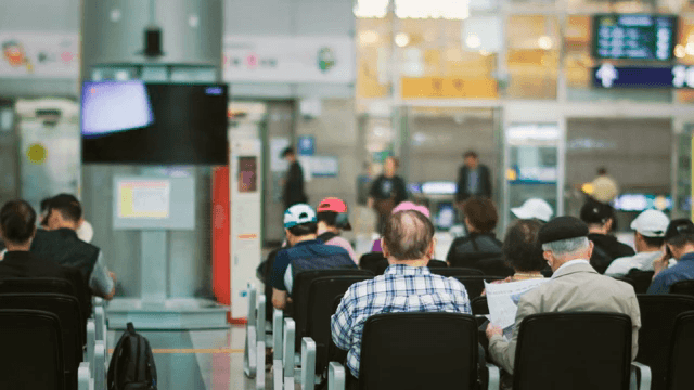 People waiting in an train terminal