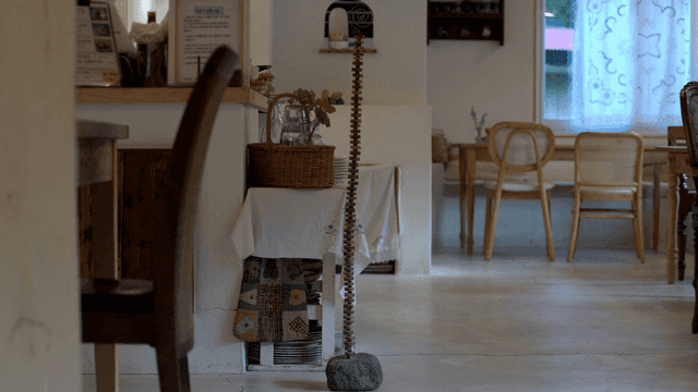 Cozy cafe interior with wooden chairs