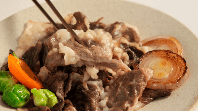 Grilled beef with vegetables on a plate