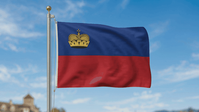 Liechtenstein flag fluttering under clear sky